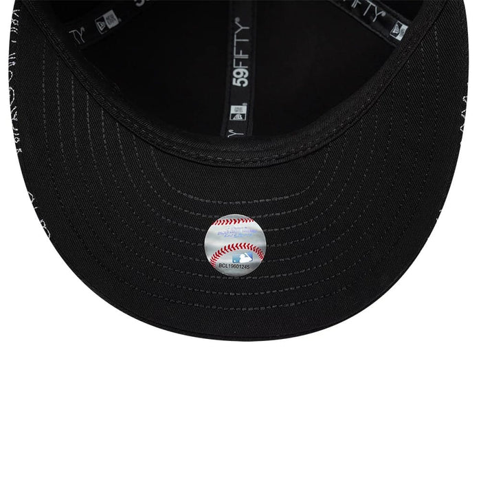 Pictured is this MLB All Over Paisley Chicago White Sox Low Profile 59FIFTY Fitted cap in black. 7