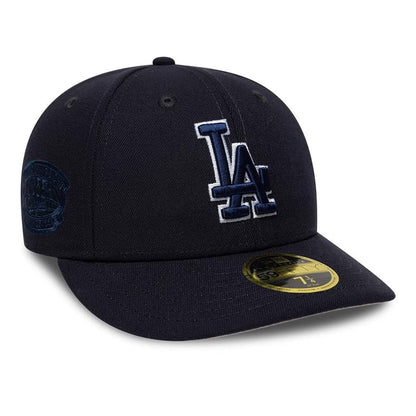 Pictured is this MLB College Varsity LA Dodgers Low Profile 59FIFTY Fitted cap in navy. 4