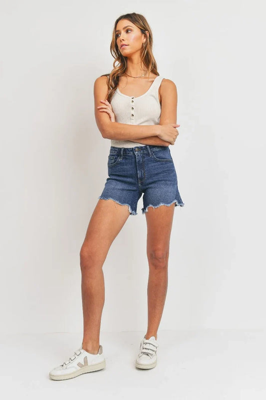 Woman’s denim tomboy short with high-low hem detail for summer wear