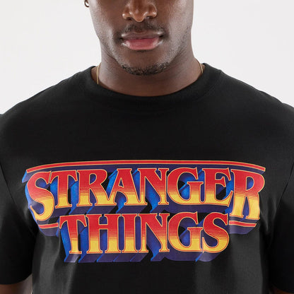The model is wearing this Netflix Stranger Things T-Shirt in black. 5