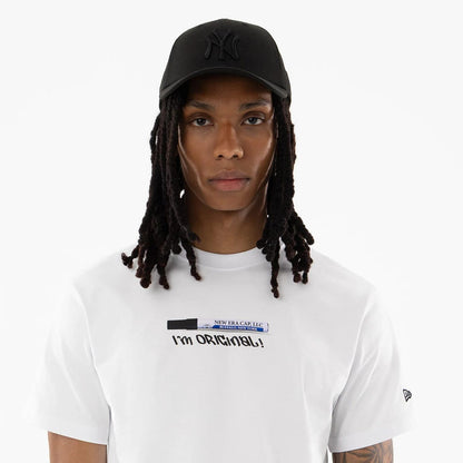 The model is wearing this New Era I Am Original T-Shirt in white. 6