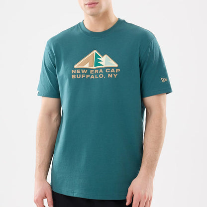 The model is wearing this New Era Outdoor Mountain T-Shirt in dark green. 7