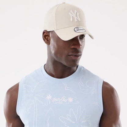 The model is wearing this New Era Resort Tank Top in blue. 6