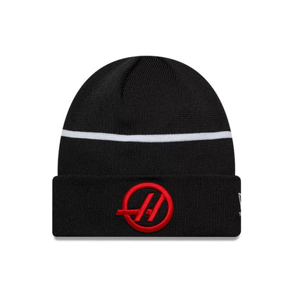 Pictured is this Esteban Ocon TGR Haas F1 Cuff Knit Beanie hat in black. 1