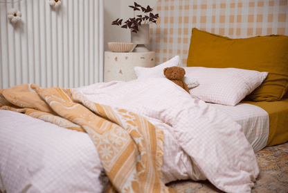The Midnight Gang Blush Gingham Bed Wetting Mat