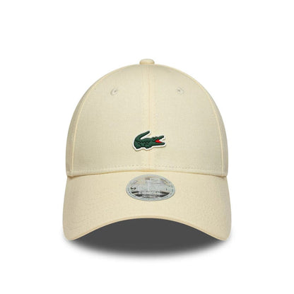 Pictured is this Womens Lacoste X New Era 9FORTY cap in light beige. 2